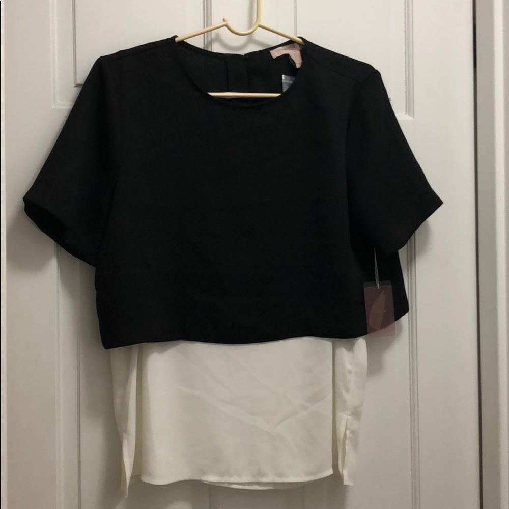 Woven black and white top